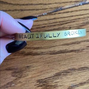 “Beautifully Broken” inscribed gold tone bracelet